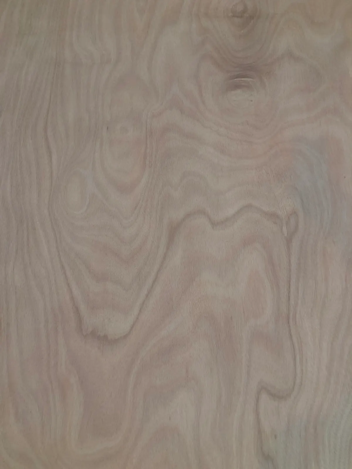 Okoume marine plywood face veneer grain close-up